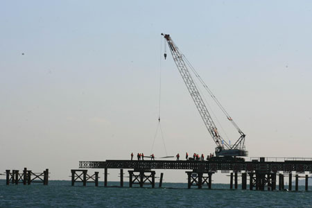 China's first anchored suspension bridge starts offshore construction