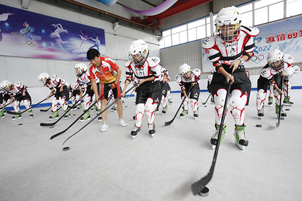 Trainers in China trying to get the balance right on ice