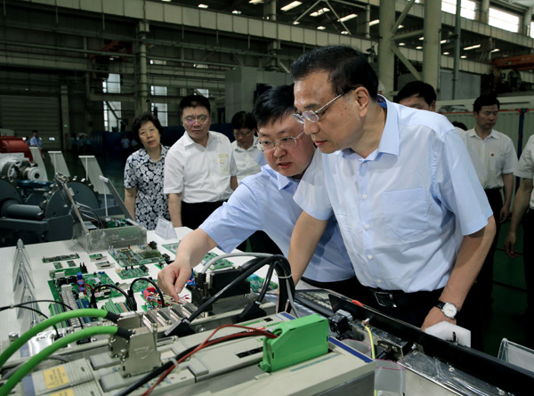 Li calls robots vital to productivity