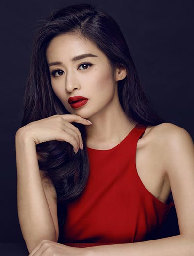 Actress Ying Er poses in red