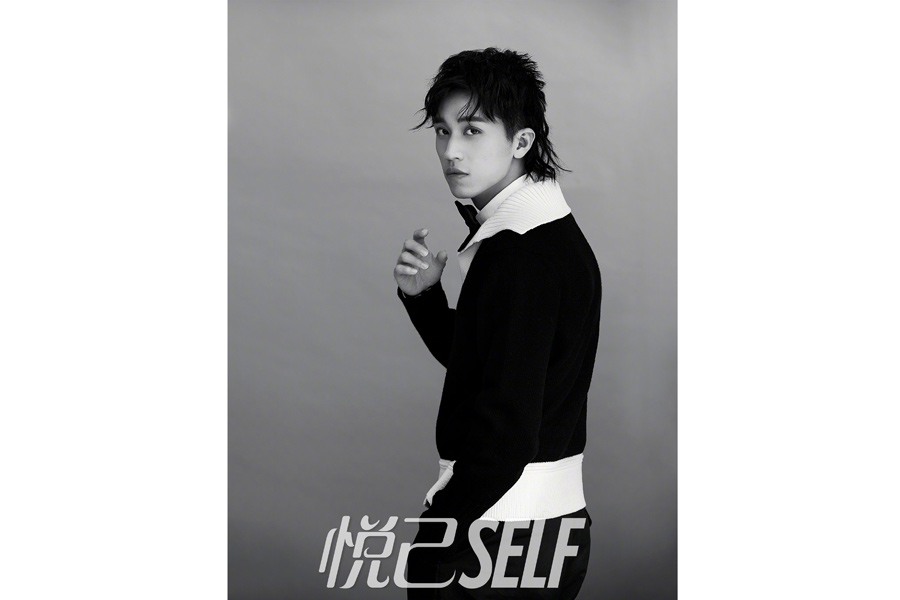 Actor Xu Weizhou poses for fashion magazine