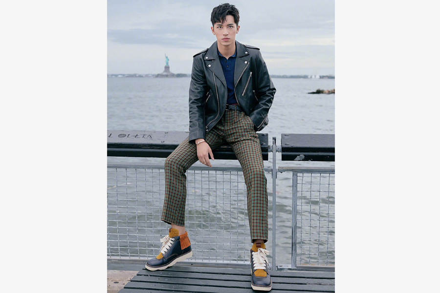 Actor Xu Weizhou poses for fashion magazine