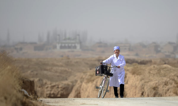 Rural doctor who has worn out 20 bikes