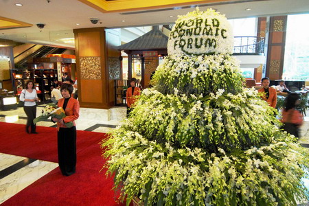 Flower-dotted Dalian welcomes guests for Summer Davos