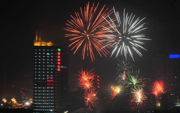 Fireworks light up sky on Chinese New Year's Eve