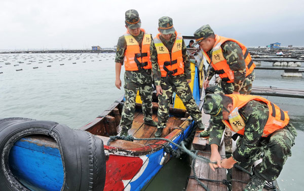 Dual typhoons lash coastal regions in East China