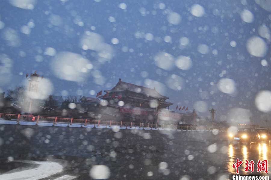 Late-arriving snowfall quenches thirst of Beijing