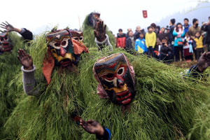 Nuo Dance performed in Fenlong Festival in Hechi, S China