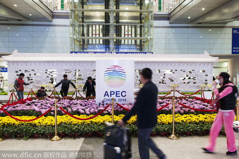 Volunteers aim high for APEC