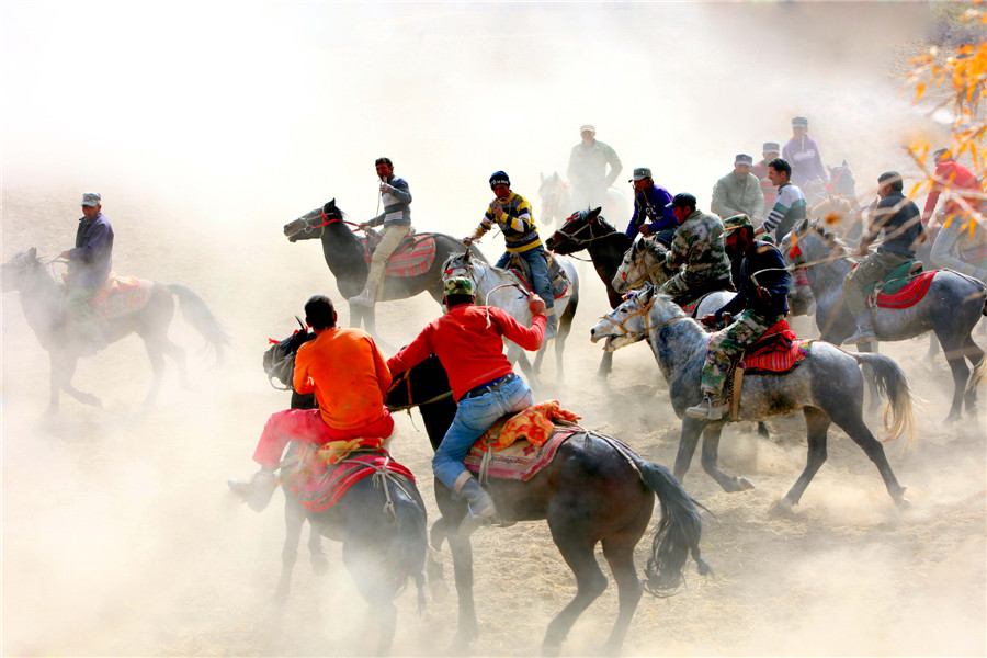 Herdsmen of Tajik ethnic group play traditional game