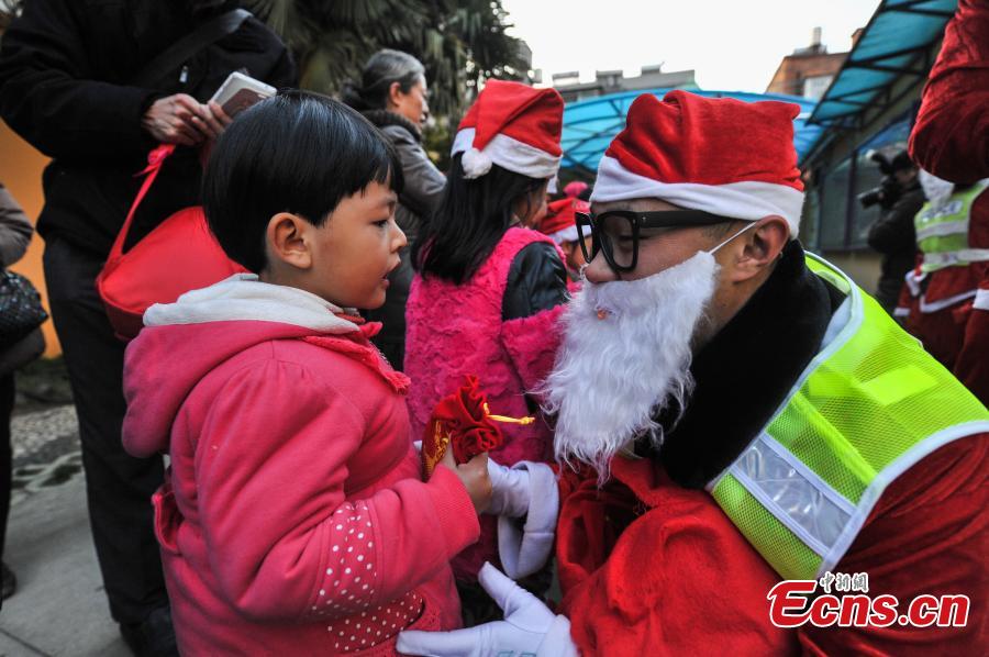 Santa traffic policemen add festivity to the streets