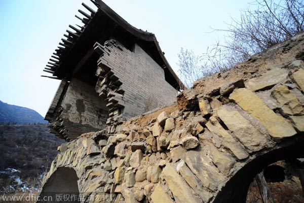 Future of 100-year-old temple hangs in air