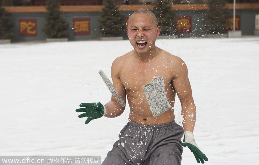 Buddhist monk breaks brick in kung fu