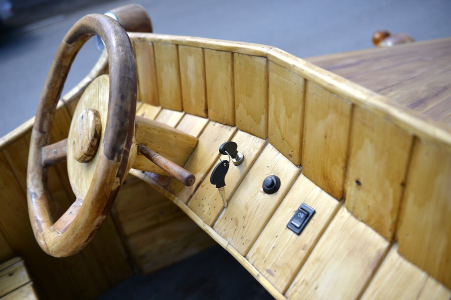 Chinese man makes antique car out of wood