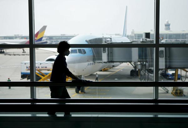 Airlines cut flights to South Korea as China steps up MERS alert