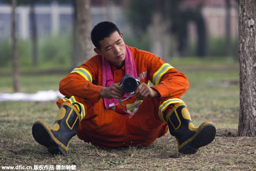 Firefighters: a steady presence at Tianjin blast site