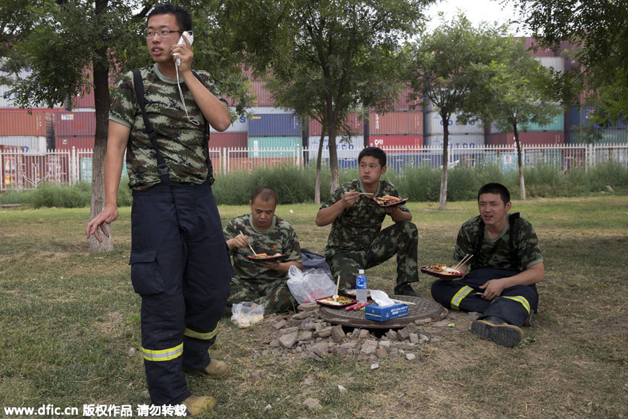 Firefighters: a steady presence at Tianjin blast site