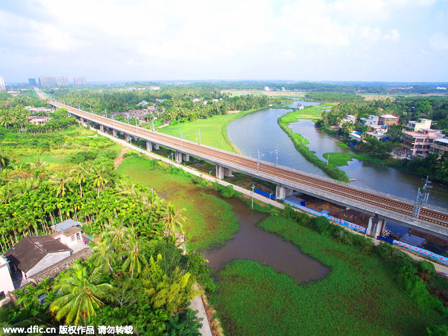 World's first high-speed train line circling an island opens in Hainan