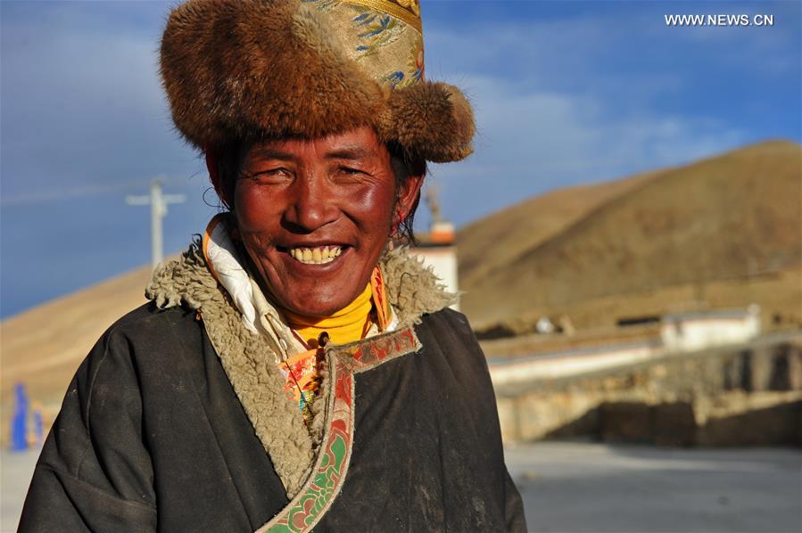 Villagers gather to dance 