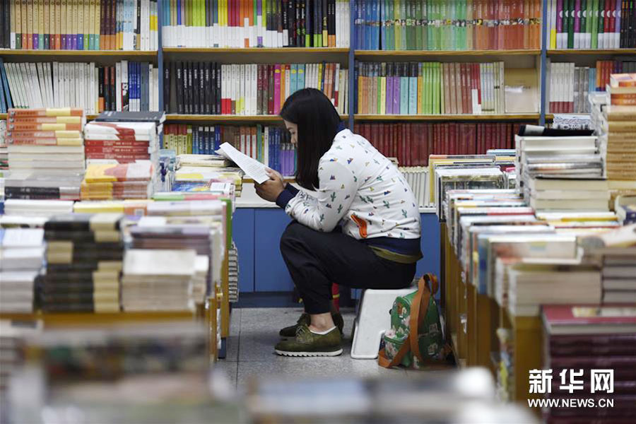 Readers at a 24-hour bookstore in Beijing