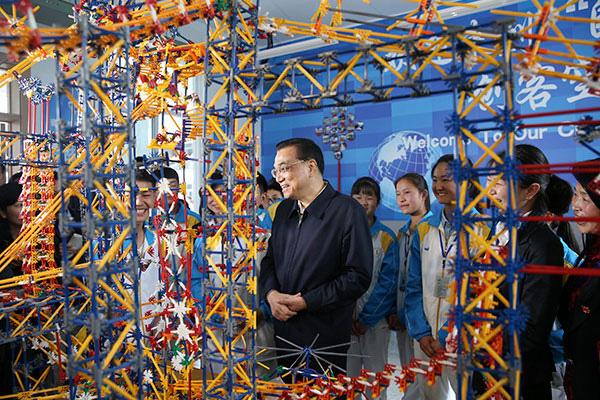 Premier Li stresses building solid schools and hospitals in Lushan