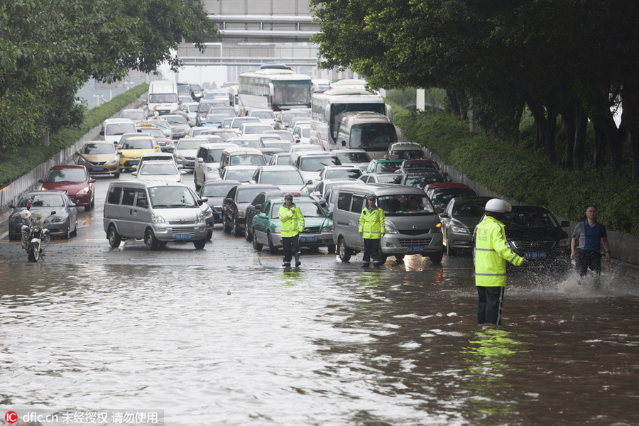 Heavy rains flood streets in Guangzhou