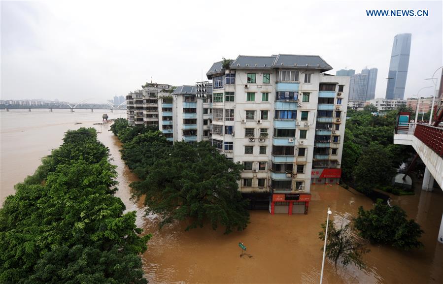 13 dead, 13 missing in China rain, landslides