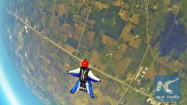 Chinese skydiver brings childhood dream to life