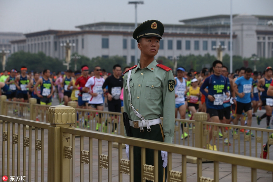 Runners compete during Beijing marathon