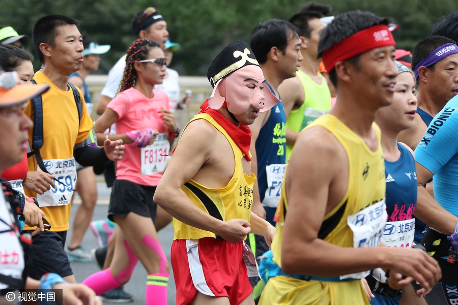 Runners compete during Beijing marathon