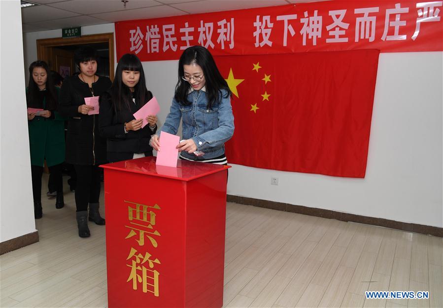 Xi casts vote for new lawmakers