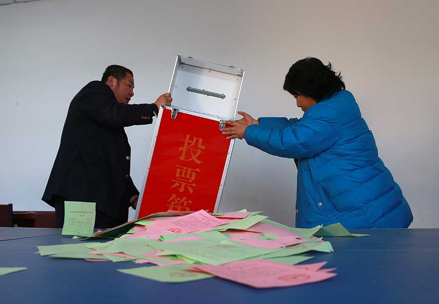 Xi casts vote for new lawmakers