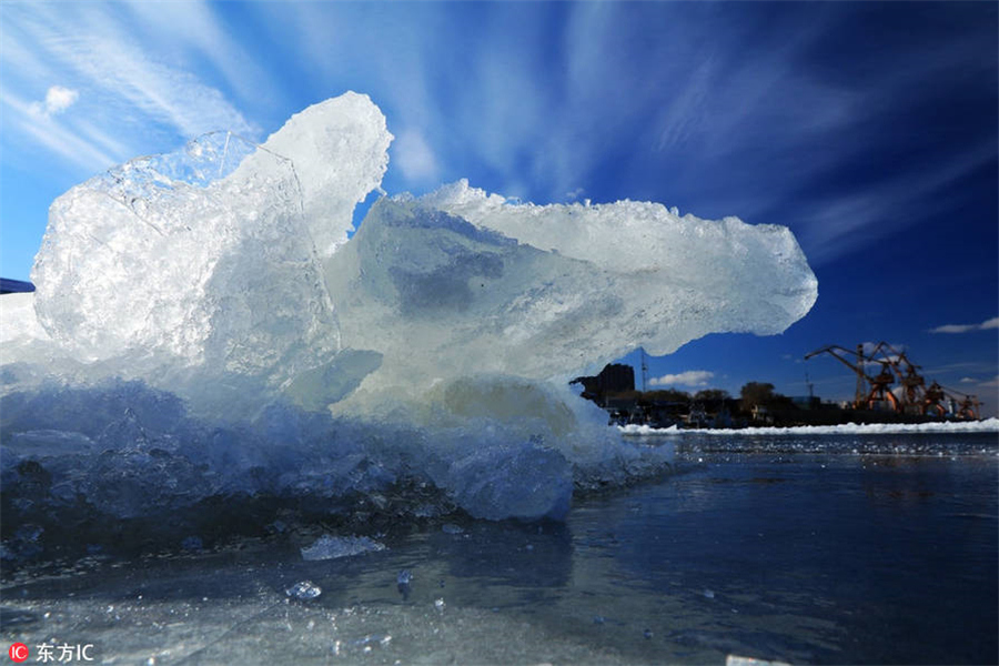 Ice sparkles under dazzling colors in Heilongjiang