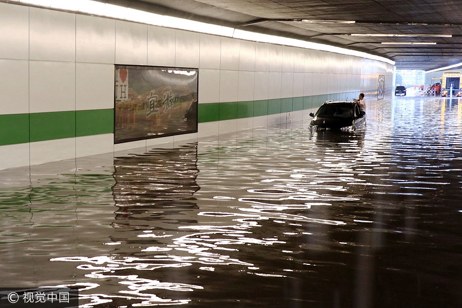 Torrential rain sweeps southern China