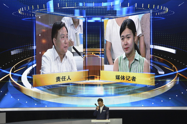 Officials questioned on Wuhan TV show