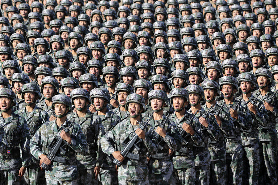 Xi inspects troops as China's military might on show