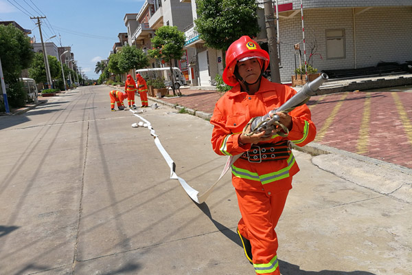 Women man the fire brigade in remote East China village