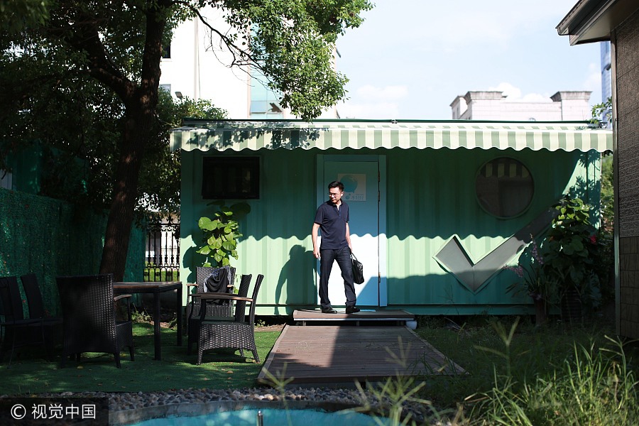 Businessman makes home in container