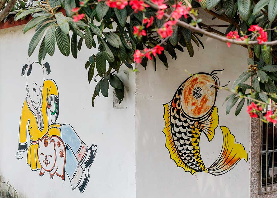 New Year paintings decorate cottage walls in spring