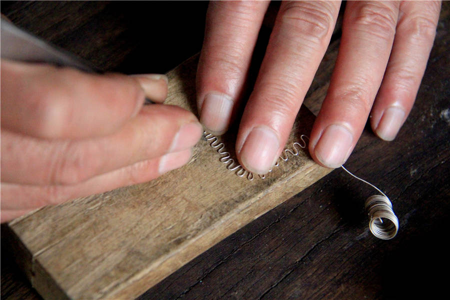 Craftsman sticks to handmade silver craft