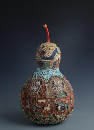 Exhibition showcases ancient art carved on gourds