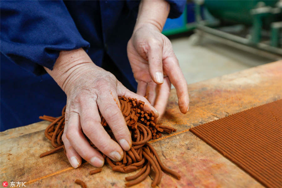 Incense maker sticks to traditional methods