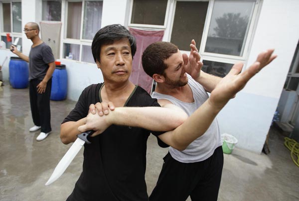 Martial arts master instructs foreigners