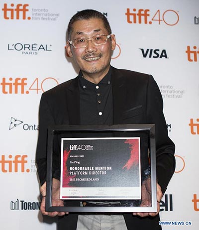 China's He Ping receives honourable mention of Platform Director