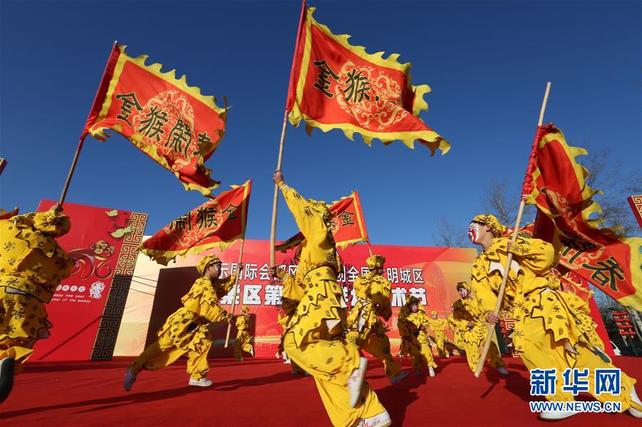 Children dress up to greet the Year of the Monkey