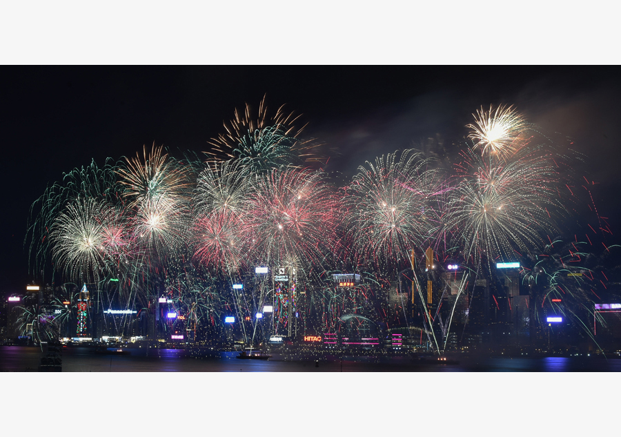 Spring Festival celebrated with fireworks over Victoria Harbour in Hong Kong