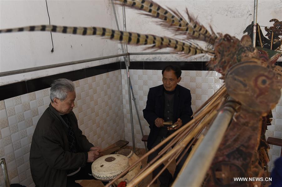 Folk artists perform shadow play in SW China