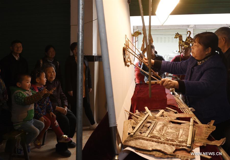 Folk artists perform shadow play in SW China