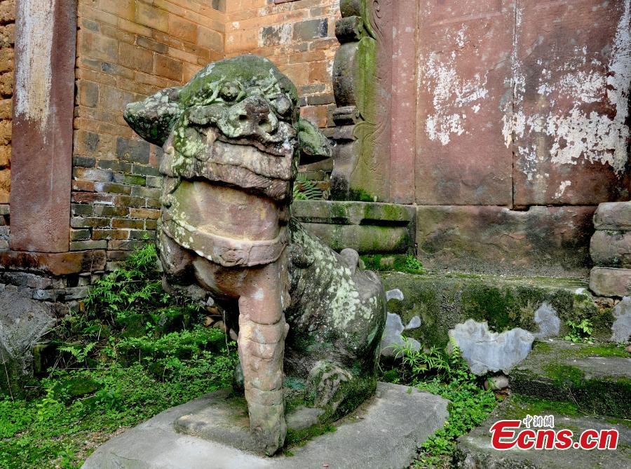 Uncared-for old memorial arch in ruins