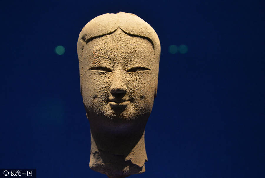 Chinese and Indian sculptures on display at the Palace Museum in Beijing